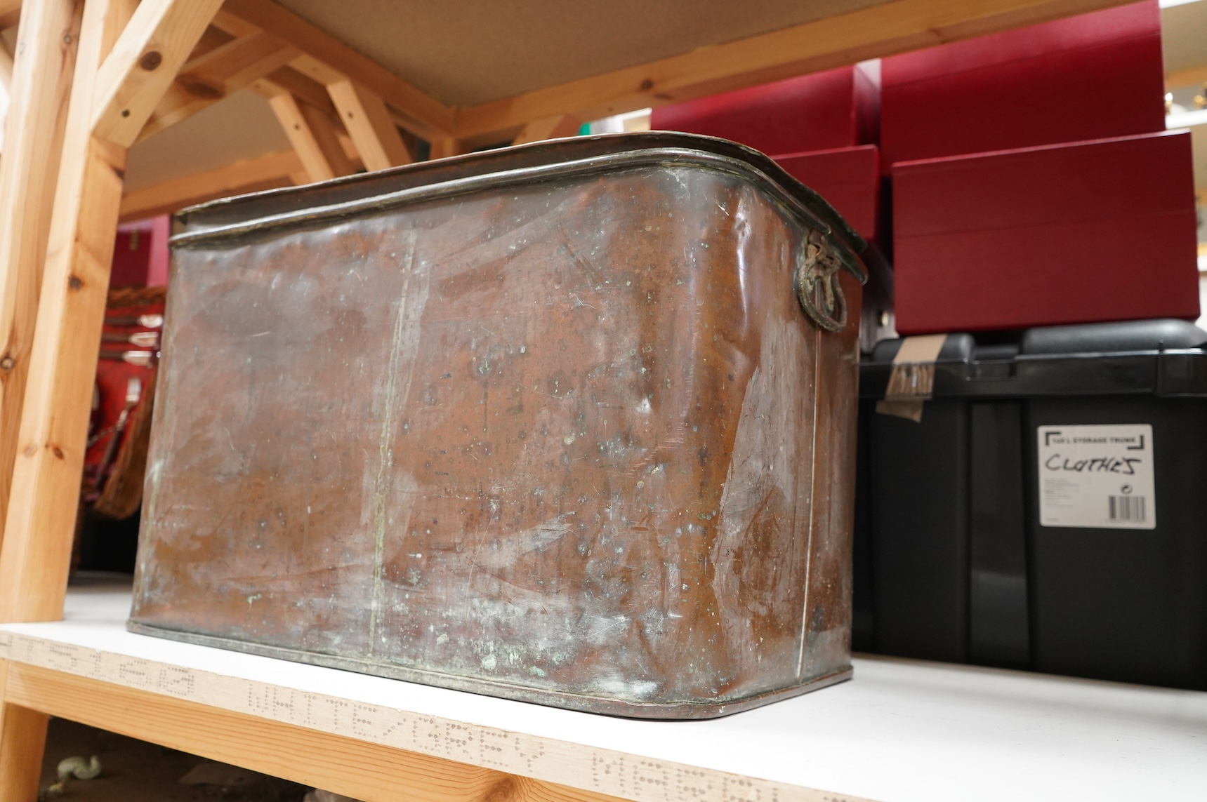 A large rectangular copper flour bin and cover, 60cm wide x 38 cm deep x 46cm high.